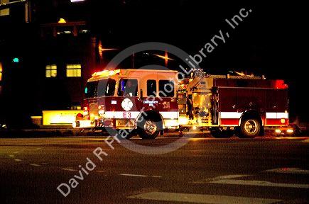 Fire engine at night in motion responding to an alarm in Boise, Idaho, USA.