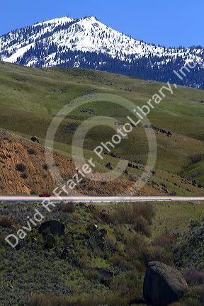 A view of snow covered Shaeffer Butte home to Bogus Basin ski resort along Hwy 55 in Boise County, Idaho, USA.