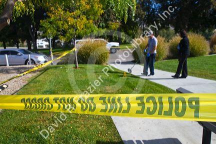 Police caution tape at the scene of a crime in Boise, Idaho, USA.