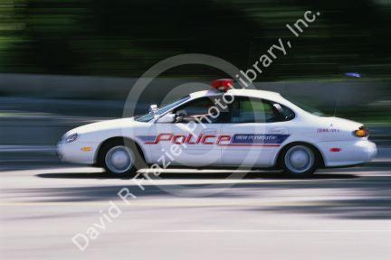 A police car in motion.