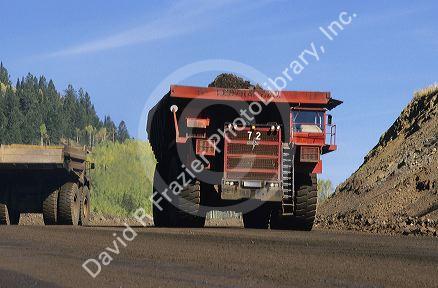 A large truck used in an open pit phosphate mining operation.