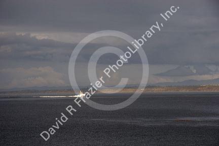 Coast Guard patrol boat returning to port at Monterey, California ahead of a storm.