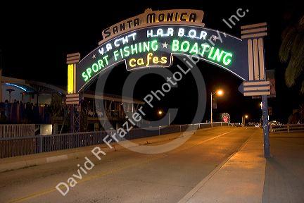 Neon sign and lights at the Santa Monica pier, California.