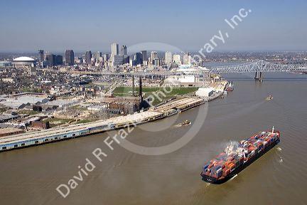 Container ship on the Mississippi River departing New Orleans, Louisiana.
