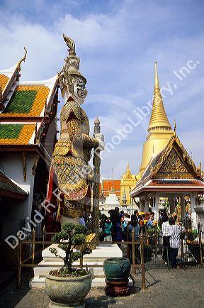 The Grand Palace in Bangkok, Thailand.  Statue is a yak giant.