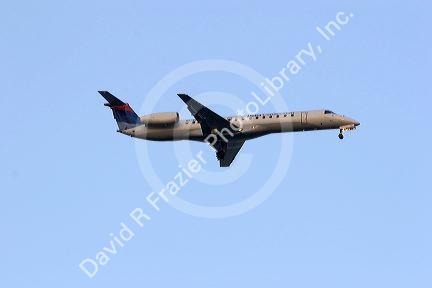 Commuter jet,  regional jet airplane in flight.