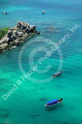 Boats anchored of the coast of Phuket Island, Thailand.