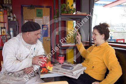 Man and woman talking at a coffee shop in Boise, Idaho.