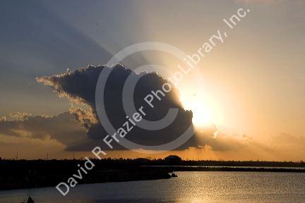 Sunset behind storm cloud on Lake Pontchartrain, Louisiana.