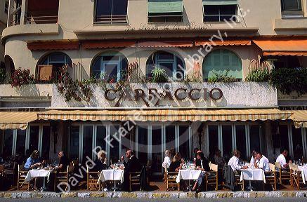 Customers dine at an outdoor cafe in Nice, France.
