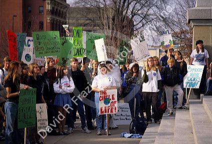 Students stage a demonstration Against Vanishing Ecosystems.