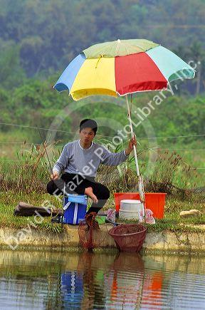 A man fishing in Taiwan.