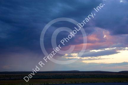 Rain falling from clouds in the desert east of Boise, Idaho.