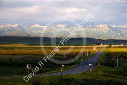 Idaho Highway 33 in Teton County with Teton Mountains near sunset looking east.