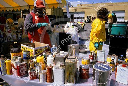 Volunteers help dispose of toxic household products such as paint and cleaners in Seattle, Washington.