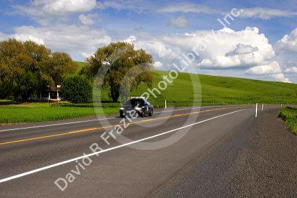 Sheriff's patrol car speeding on an emergency response in Washington state.