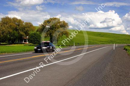 Sheriff's patrol car speeding on an emergency response in Washington state.