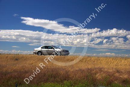 Automobile traveling on the highway.