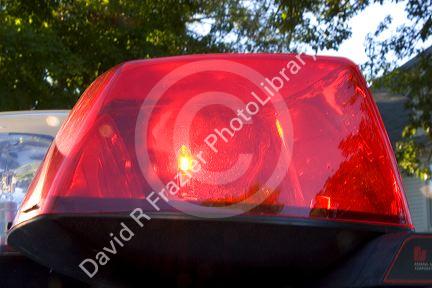 Flashing lights on top of a police car.
