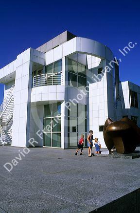 Children play near a modern art sculpture in front of the Art Center in Des Moines, Iowa.