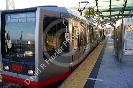A street car or trolley parked at a station in San Francisco, California.