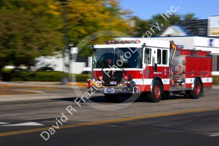A fire truck in motion responding to an alarm. Boise, Idaho.