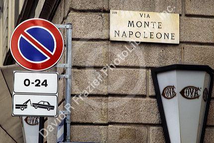 No parking sign and Via Monte Napoleone street  sign in Milan, Italy.