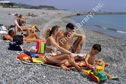 A beach scene with family along the Ligurian Coast in Italy.