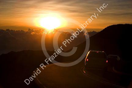 Sunrise above the clouds at Mount Haleakala on the island of Maui, Hawaii.
