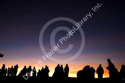 Tourists await the sunrise atop Mount Haleakala on the island of Maui, Hawaii.