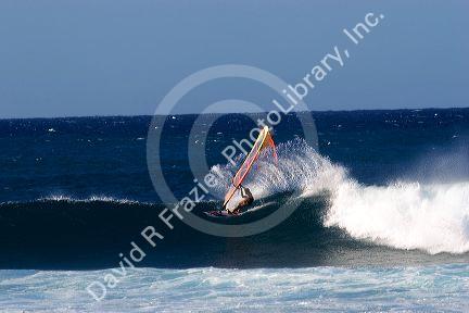 Windsurfing in the pacific ocean off the island of Maui, Hawaii.