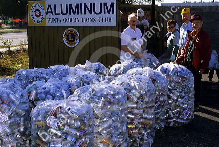 Senior citizens from the lions club in Punta Gorda Florida recycle aluminum cans.