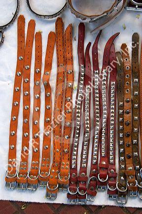 Leather dog collars being sold on the sidewalk in Buenos Aires, Argentina.