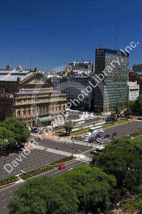 Overview of 9th of July Avenue in Buenos Aires, Argentina and Teatro Colon at left.