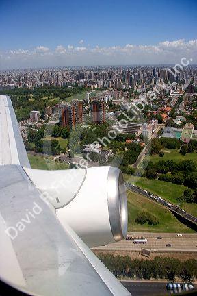 Airplane jet engine and aerial view of Buenos Aires, Argentina.