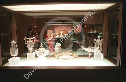Visitors looking at  16th century crystal in the Prado art museum in  Madrid, Spain.