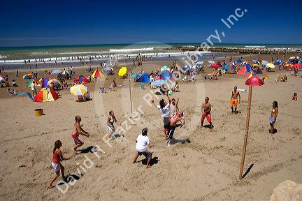 People play volleyball on the beach near Miramar Argentina.