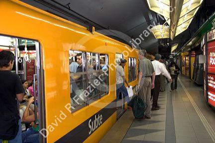 Passengers getting on and off the subway in Buenos Aires, Argentina.
