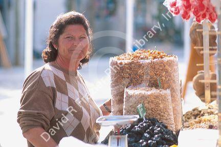Street vendor selling nuts in Nerja, Spain.