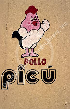 A market sign for chicken in Puerto Rico.