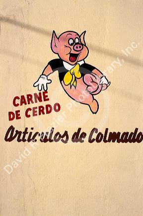 Market sign for pork in Puerto Rico.