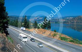 Automobiles travel on Interstate 84 through the Columbia River Gorge in Oregon.