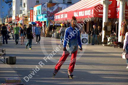African american man rollerblading at Venice Beach in Los Angeles, California.