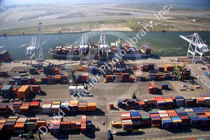 Container ships and cranes at the Port of Oakland, in the bay area of California.
