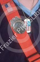 Close up of a school crossing guard wearing a badge.