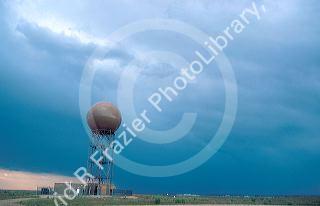 Doppler weather radar south of Boise, Idaho with storm clouds in background.
