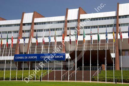 Council of Europe building and flags of member nations in Strasbourg, France.