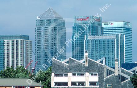 Modern office tower buildings in the Canary Wharf area of London, England.