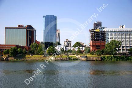 Old Statehouse and modern office buildings along the Arkansas River at Little Rock, Arkansas.