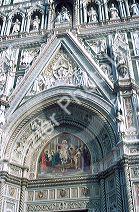Painting and sculpture adorns the exterior of the Duomo in Florence, Italy.